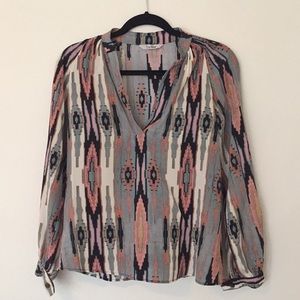 Tucker blouse with southwest design.